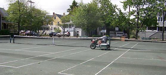 Image: Cleaning the Tennis Courts